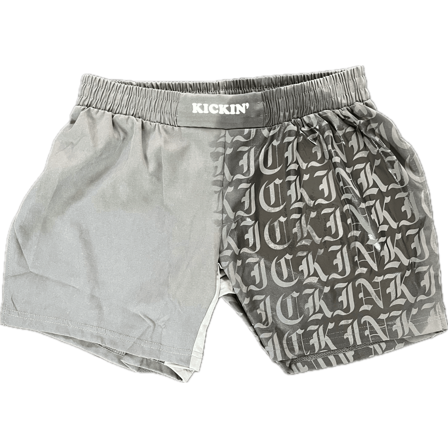 Kickin' Combat "Old English" dark gray hydrochromic high cut gladiator MMA shorts unfolded half wet