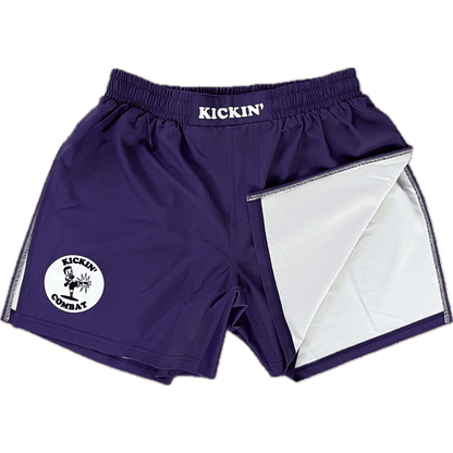 Kickin' Combat "Origins" purple high cut gladiator MMA shorts folded