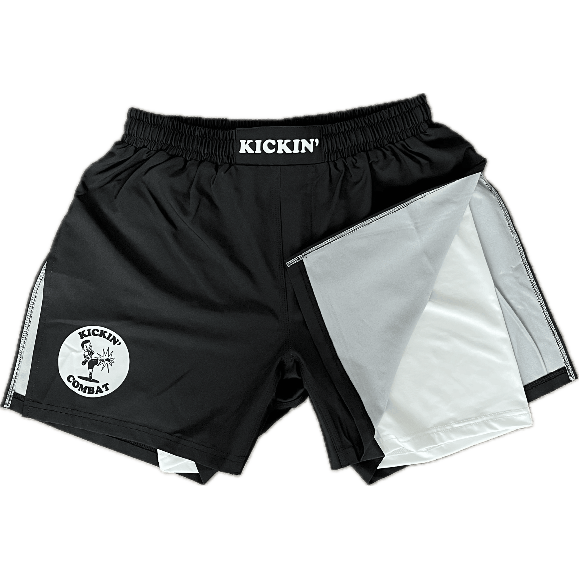 Kickin' Combat "Origins Hybrid" black high cut gladiator MMA fight shorts with white internal compression layer folded